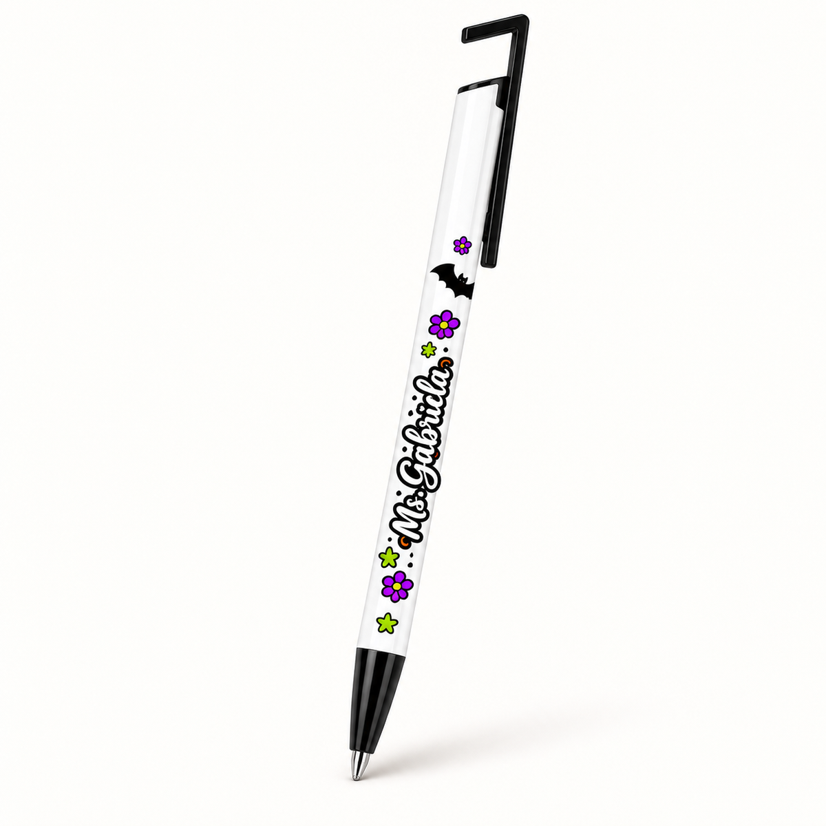 Trick or Teach personalized pen mockup with sample name Ms. Gabriela, black clip and small Halloween motifs