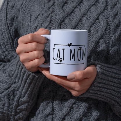 Cat Mom ceramic mug held in hands with cozy sweater