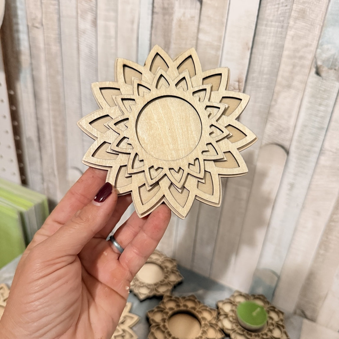 Close view of layered wooden mandala tea light holder with optional back engraving