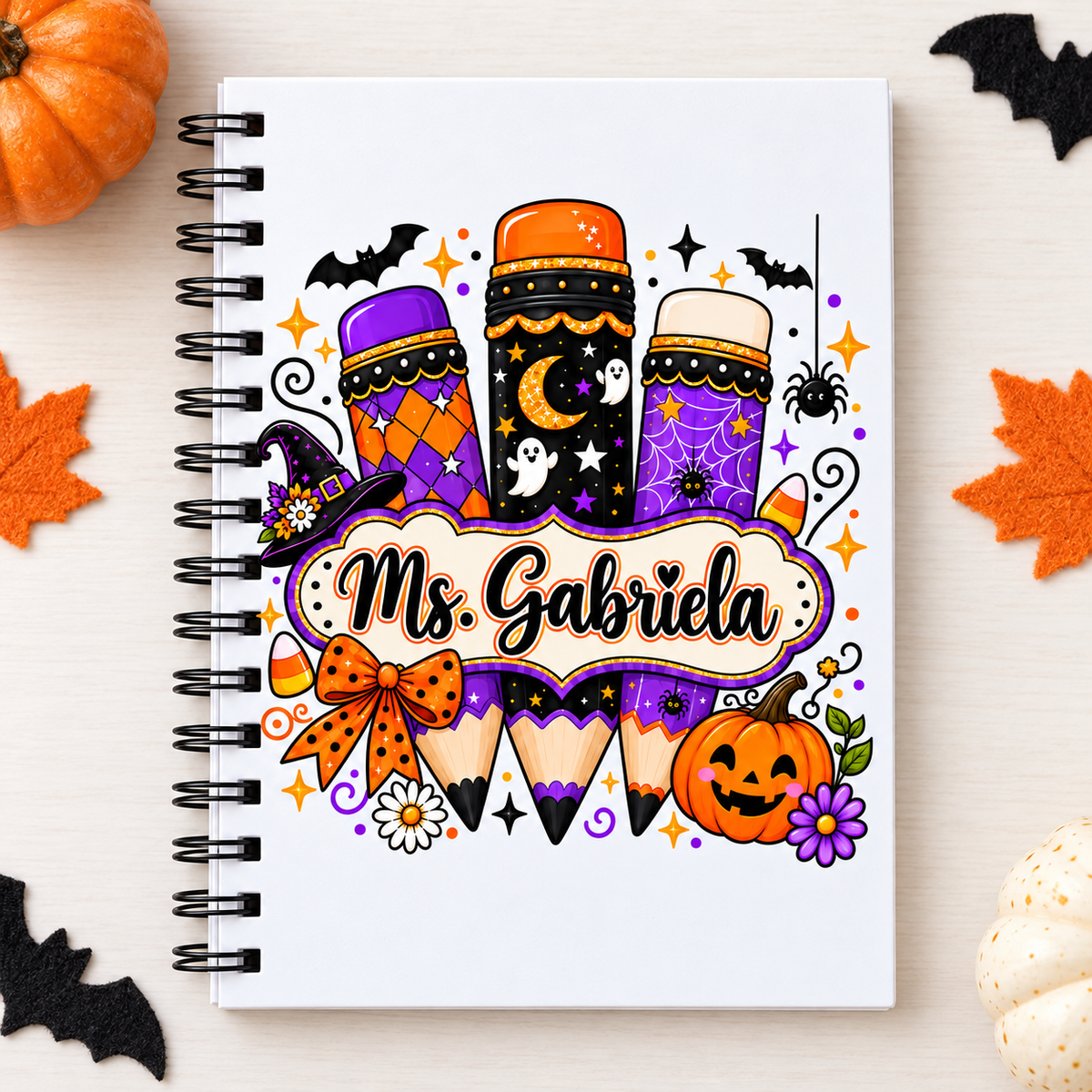 Square photo of the full personalized halloween pencil teacher notebook; sample name shown