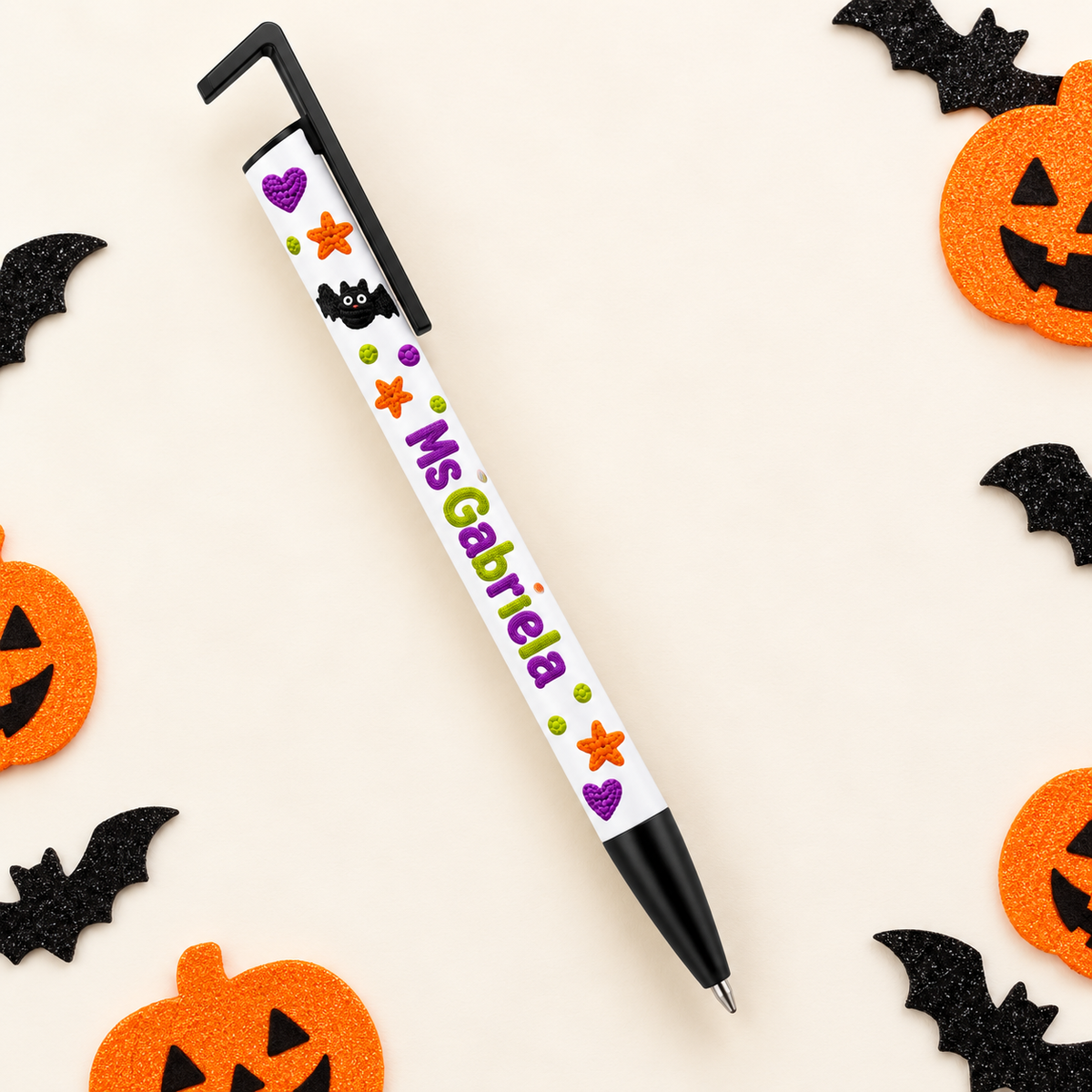 Actual white teacher pen with angular black clip and black grip, personalized sample