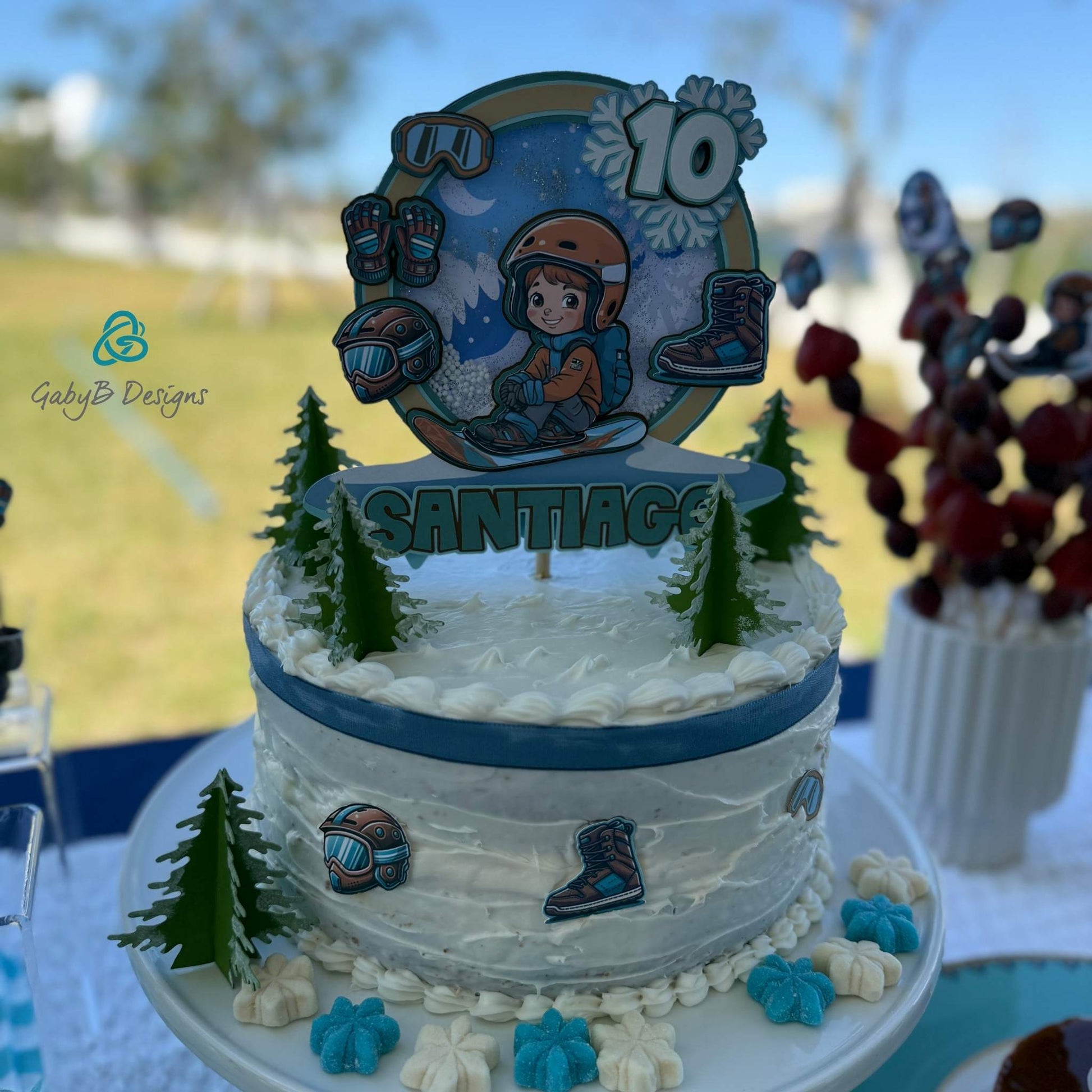 Winter sports cake topper for kids with snowboard and snowflake design
